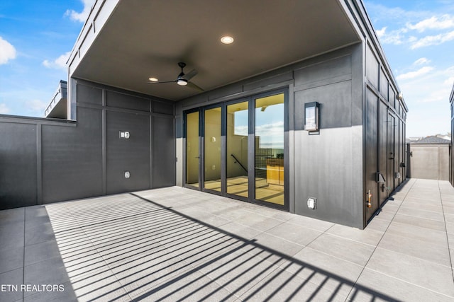 view of patio / terrace featuring ceiling fan