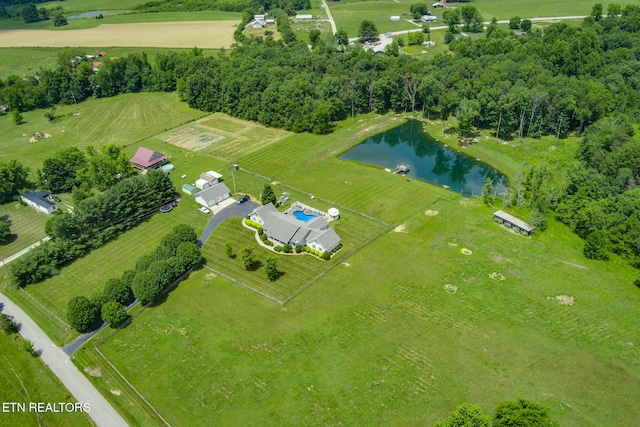 aerial view with a water view and a rural view