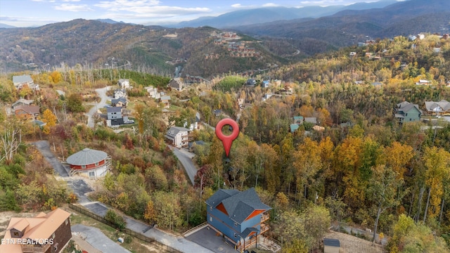 drone / aerial view featuring a mountain view