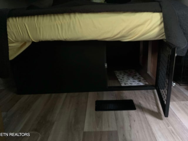 bedroom with light wood-type flooring