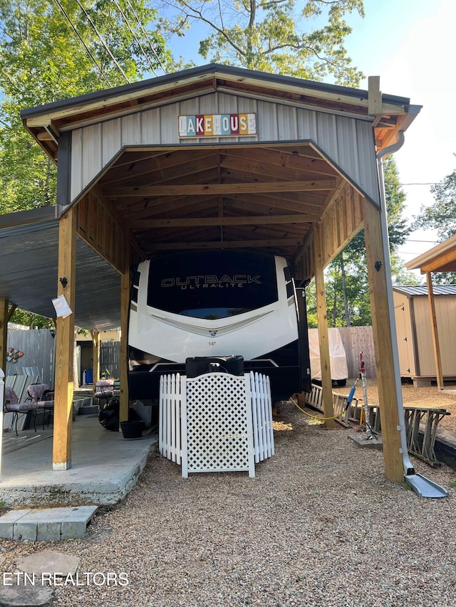 view of parking with a carport