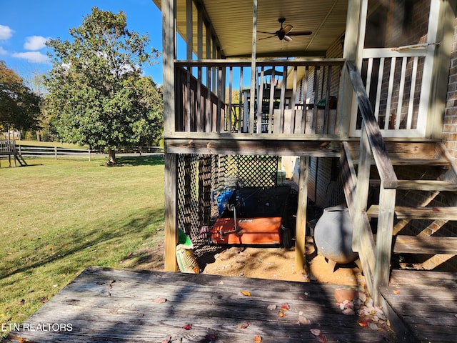 exterior space with a yard and ceiling fan