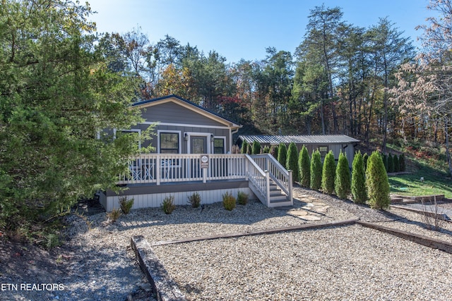 view of front of property with a deck