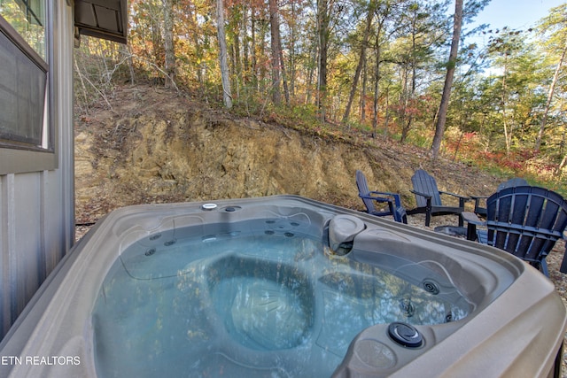 exterior space featuring a jacuzzi