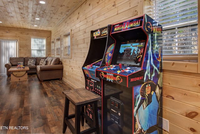 game room with wooden walls, dark hardwood / wood-style flooring, and wood ceiling