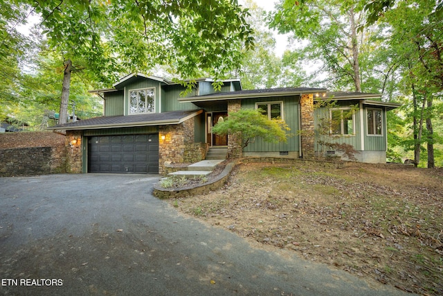 view of front of property featuring a garage