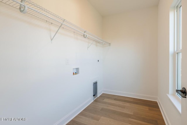 laundry room with washer hookup, hardwood / wood-style floors, and electric dryer hookup