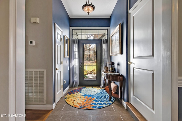 doorway featuring dark hardwood / wood-style flooring