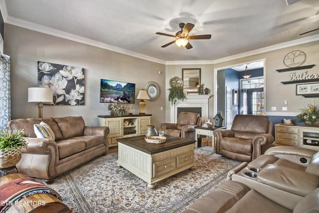 living room featuring crown molding and ceiling fan