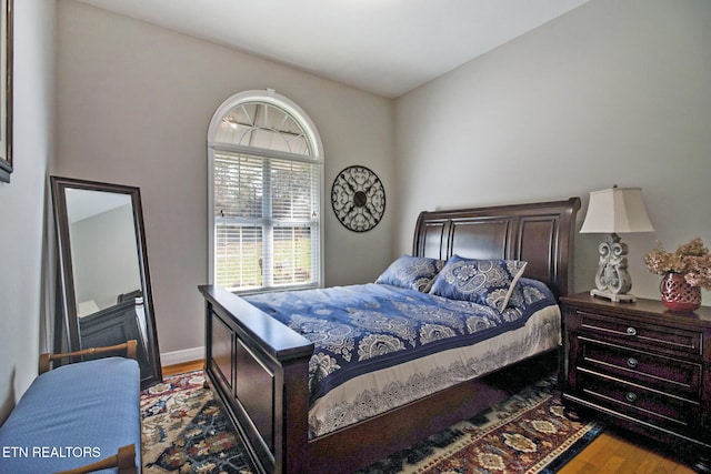 bedroom featuring wood-type flooring