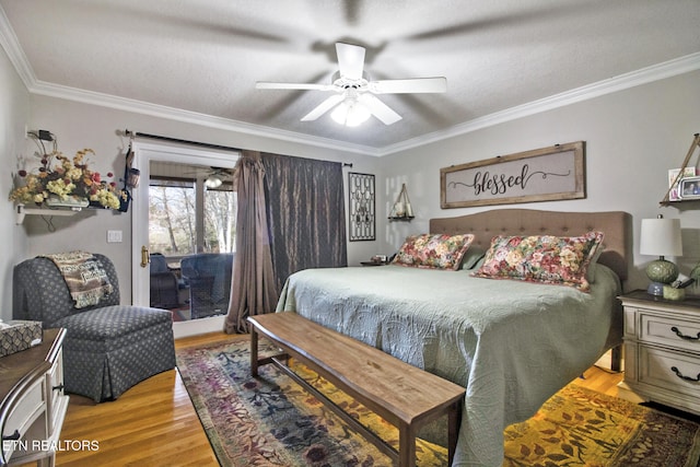 bedroom featuring ceiling fan, ornamental molding, and light hardwood / wood-style flooring