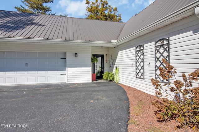 exterior space with a garage