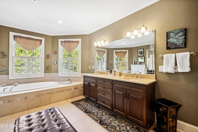 bathroom with vanity, tiled bath, crown molding, and tile patterned floors