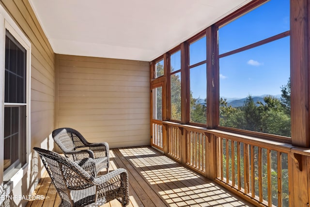 sunroom / solarium featuring a healthy amount of sunlight