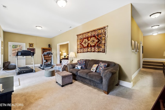 living room featuring light colored carpet