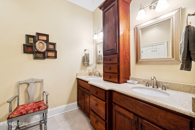 bathroom with vanity and tile patterned flooring