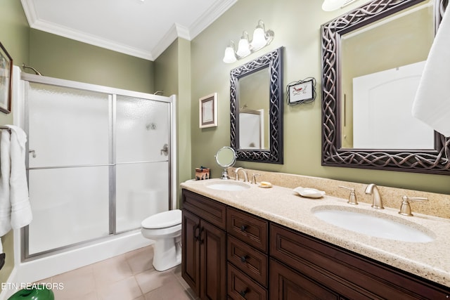 bathroom featuring a shower with shower door, toilet, tile patterned floors, vanity, and crown molding