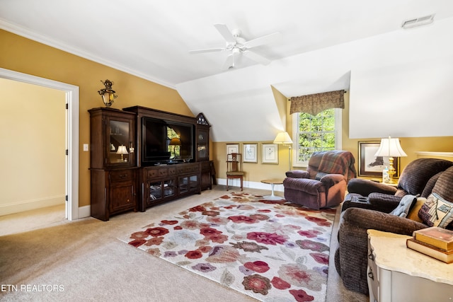 carpeted living room featuring ceiling fan and lofted ceiling