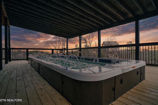 view of deck at dusk