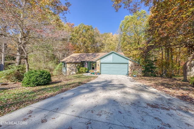 single story home featuring a garage