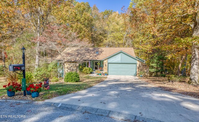 54 Heather Glen Ct, Crossville, TN 38558 - view of front facade featuring concrete driveway and a garage