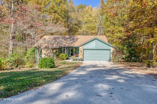 ranch-style home featuring a garage