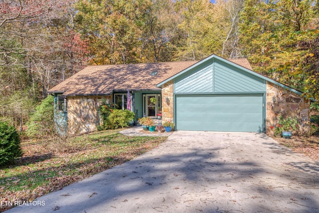 single story home with a garage