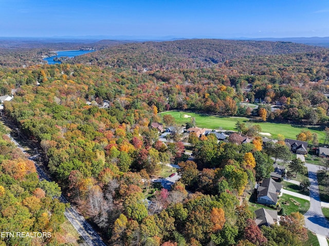 54 Heather Glen Ct, Crossville, TN 38558 - aerial view of property and surrounding area with a heavily wooded area