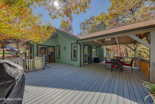 wooden terrace with ceiling fan