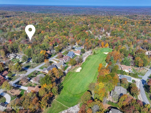 54 Heather Glen Ct, Crossville, TN 38558 - aerial view of property's location featuring a golf course, a heavily wooded area, and nearby suburban area