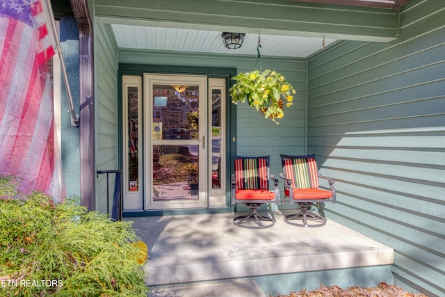 entrance to property with covered porch