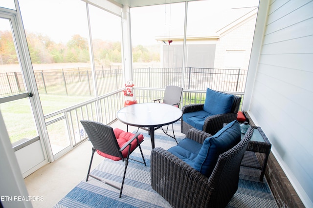 sunroom / solarium with plenty of natural light