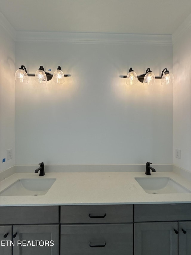 bathroom with vanity and crown molding