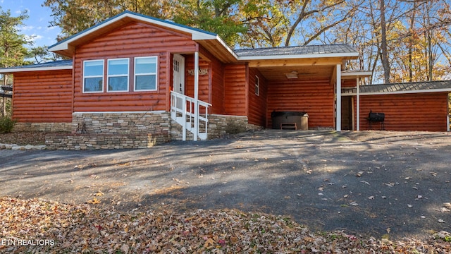 view of front of house with a carport