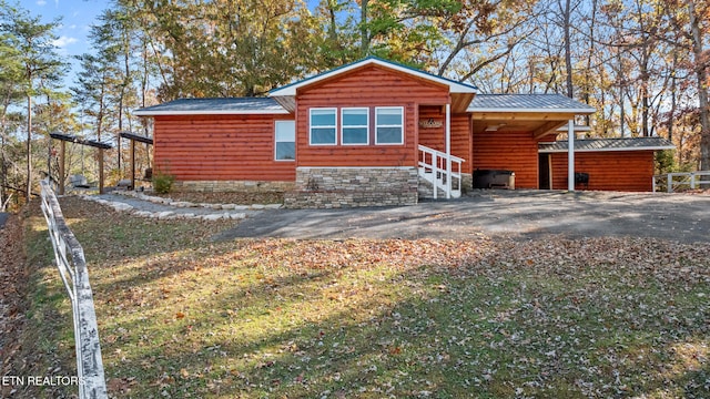 exterior space with a front lawn