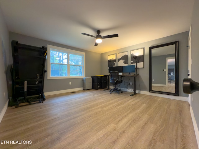 office featuring hardwood / wood-style flooring and ceiling fan