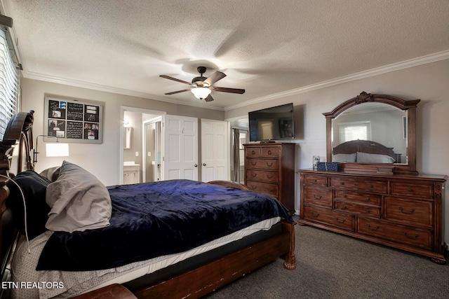 carpeted bedroom with ceiling fan, connected bathroom, a textured ceiling, and crown molding