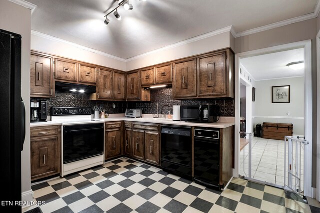 kitchen featuring decorative backsplash, black appliances, sink, and crown molding