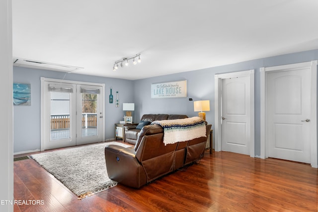 living room with dark hardwood / wood-style floors