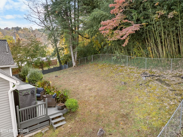 view of yard with a deck