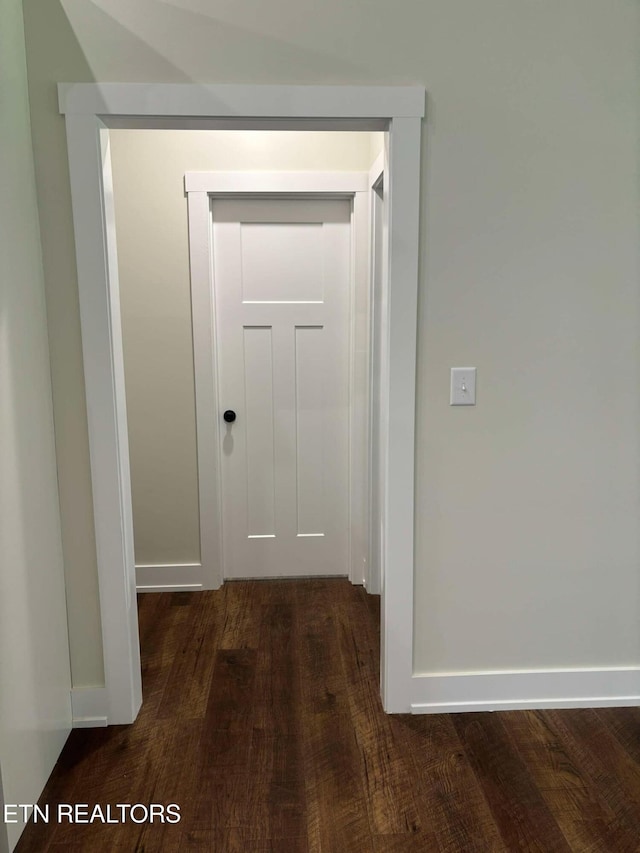 hall featuring dark hardwood / wood-style floors