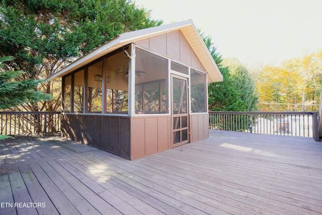 deck with a sunroom