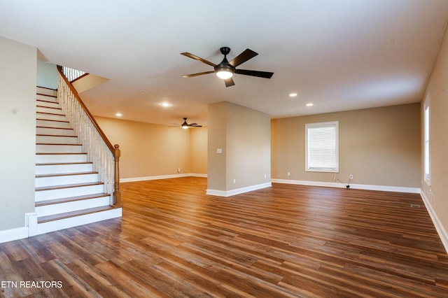 unfurnished living room with hardwood / wood-style flooring and ceiling fan