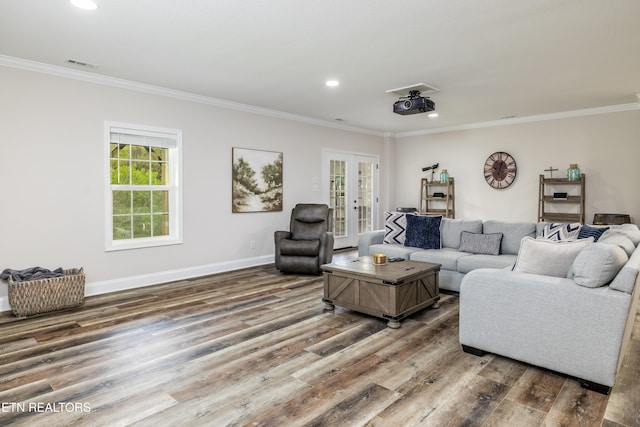 living room featuring french doors, hardwood / wood-style flooring, and ornamental molding