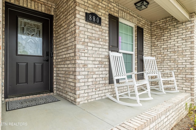 entrance to property with covered porch