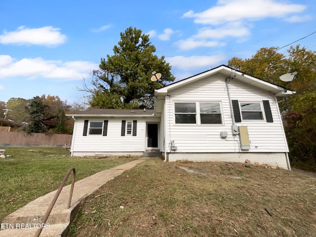 view of front of house with a front yard