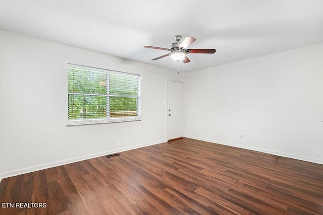 8709 Olde Colony Trl Unit 12, Knoxville, TN 37923 - spare room featuring wood finished floors, a ceiling fan, and baseboards