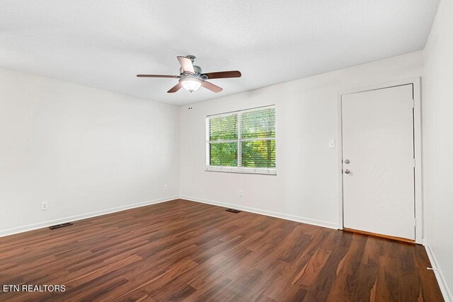 8709 Olde Colony Trl Unit 12, Knoxville, TN 37923 - spare room with wood finished floors, ceiling fan, and baseboards