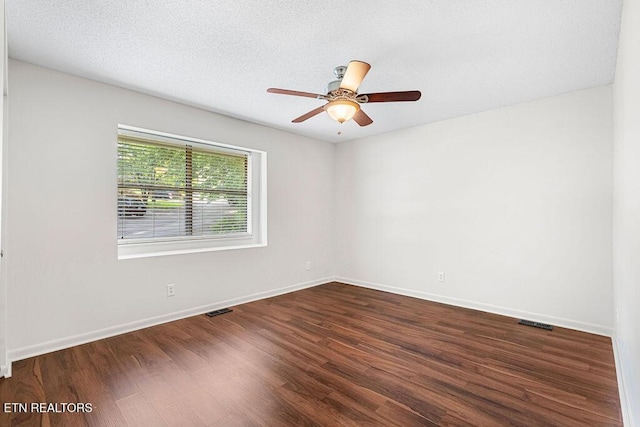 8709 Olde Colony Trl Unit 12, Knoxville, TN 37923 - unfurnished room with wood finished floors, ceiling fan, and baseboards