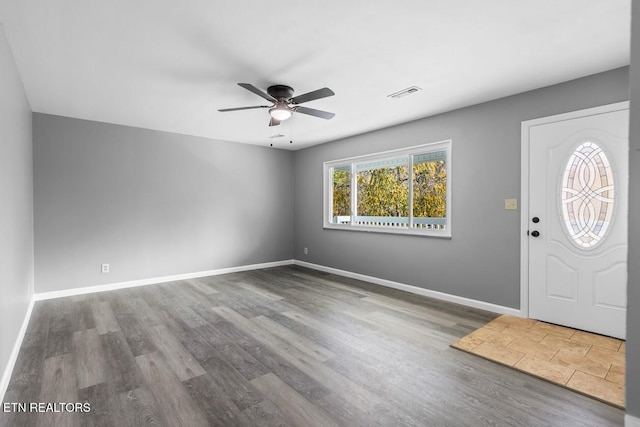 entrance foyer with hardwood / wood-style flooring and ceiling fan